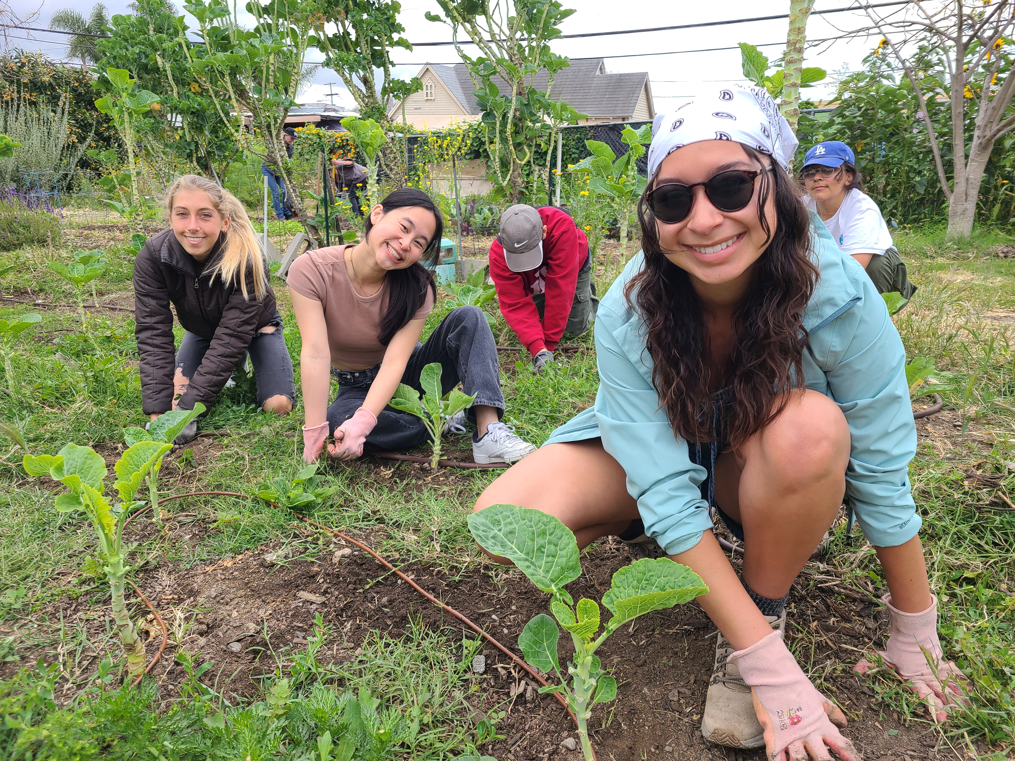 USP 142C students in a garden.